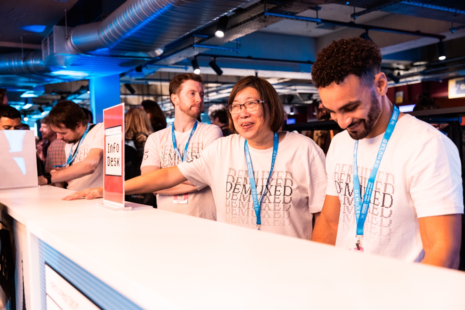Attendees at the registration desk