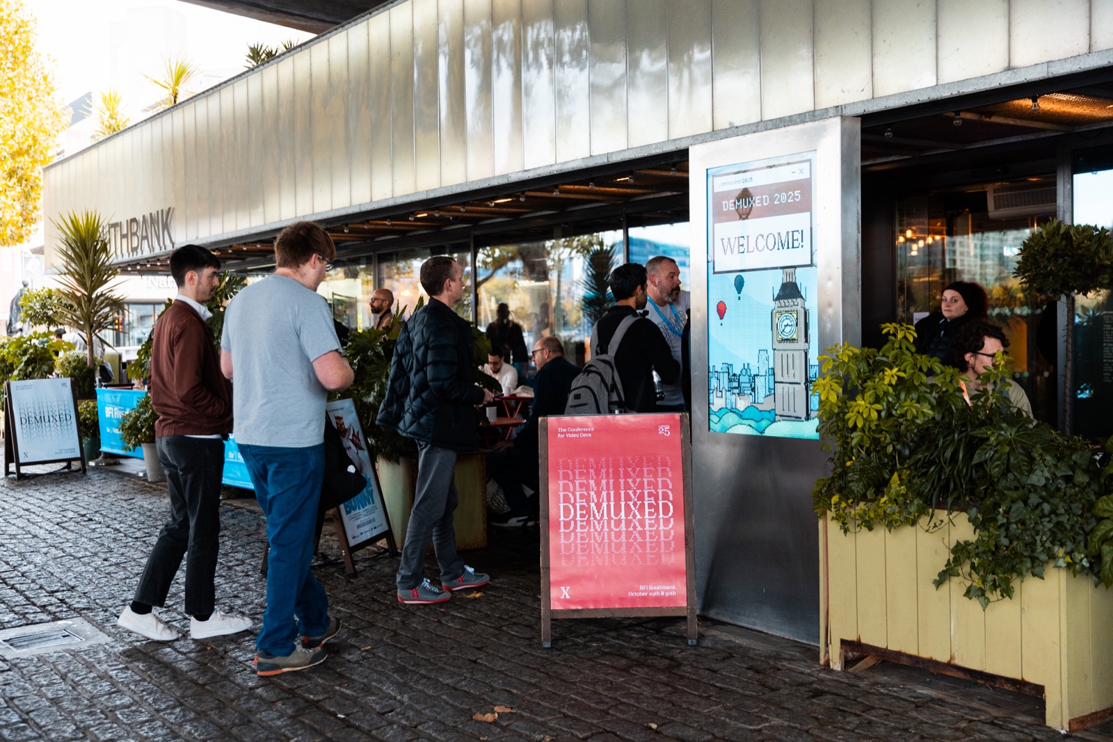 Attendees outside the venue